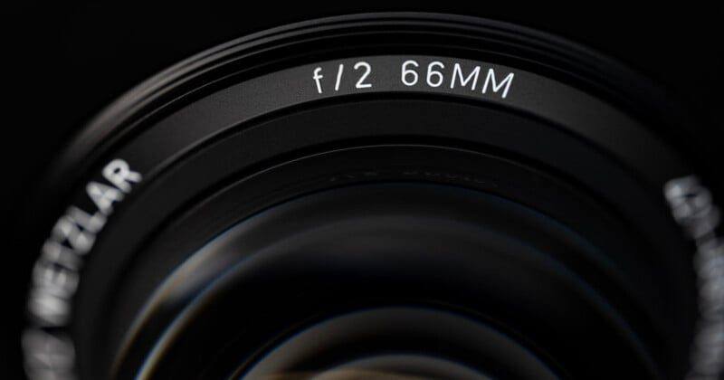 Close view of the front ring of the Summicron-M 66 f/2, with the f/2 66MM engraving and the Wetzlar name around the front element.