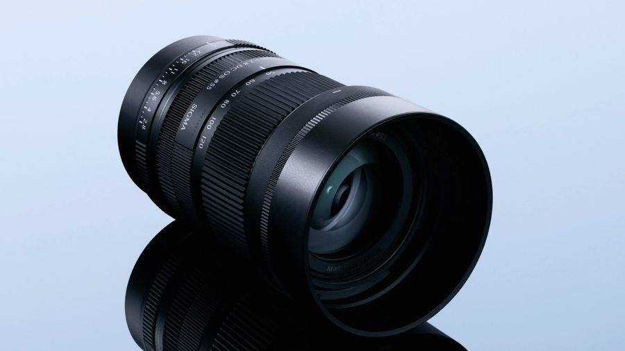 The Sigma 50-120mm F2.8 DC OS Contemporary at an angle, showing the aperture ring, the first fitted to an APS-C zoom in Sigma's Contemporary line, and the zoom scale.